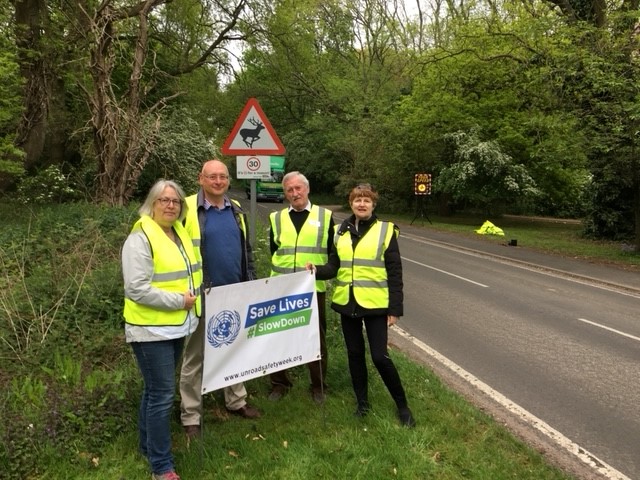 Volunteers at side of road