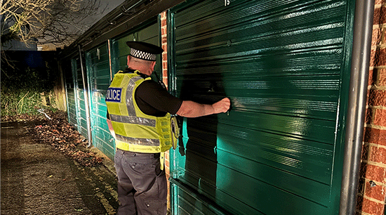 Officer checking garage