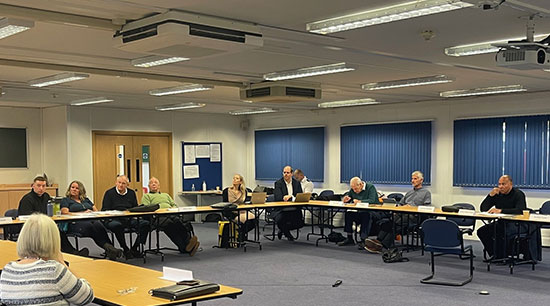 PCC in a room with panel members