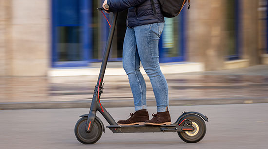 Person riding an E scooter